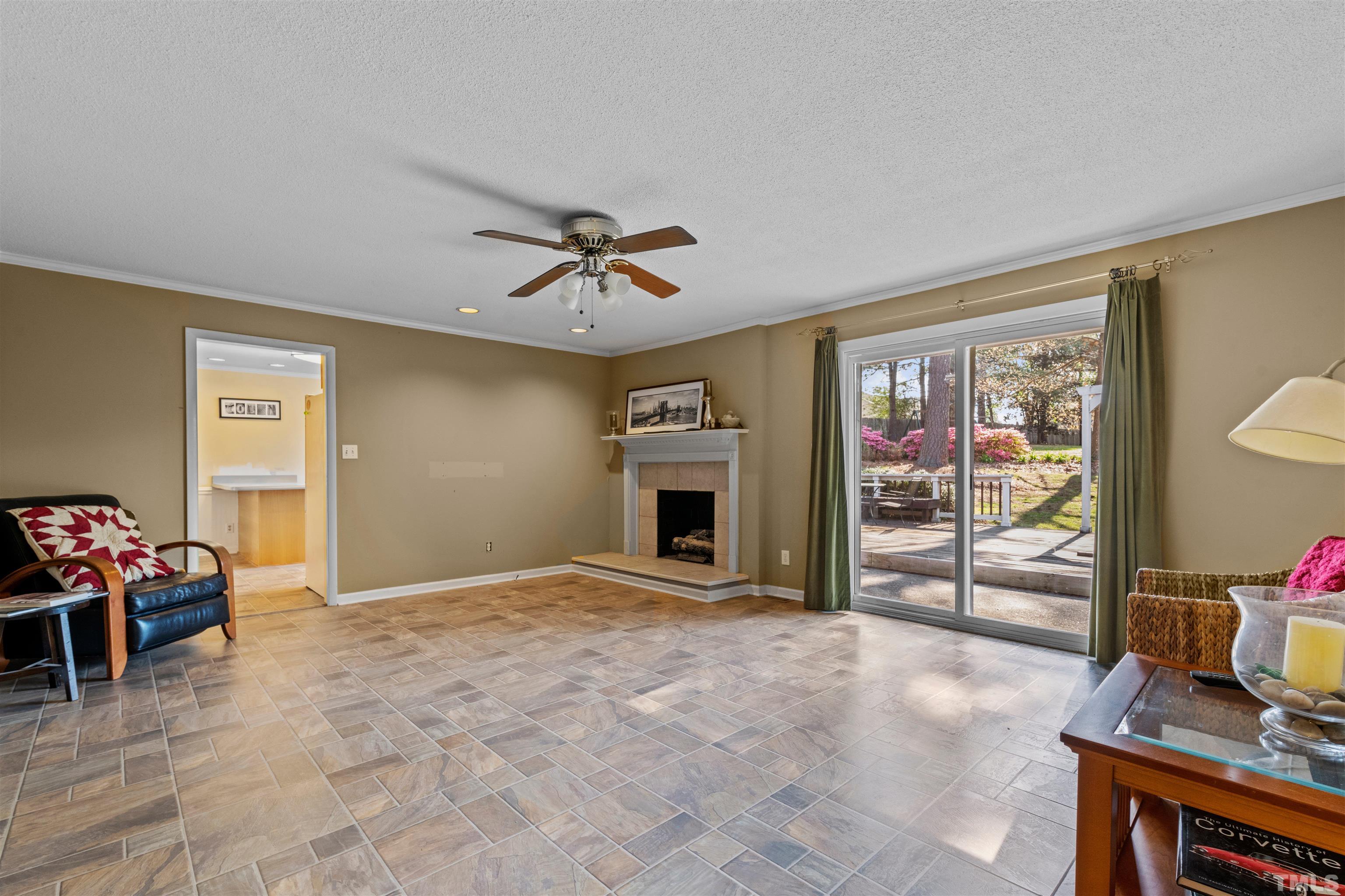 6000 Buffaloe Road Raleigh, NC 27616 - Photo 21 of 36 a view of a livingroom with furniture and a fireplace