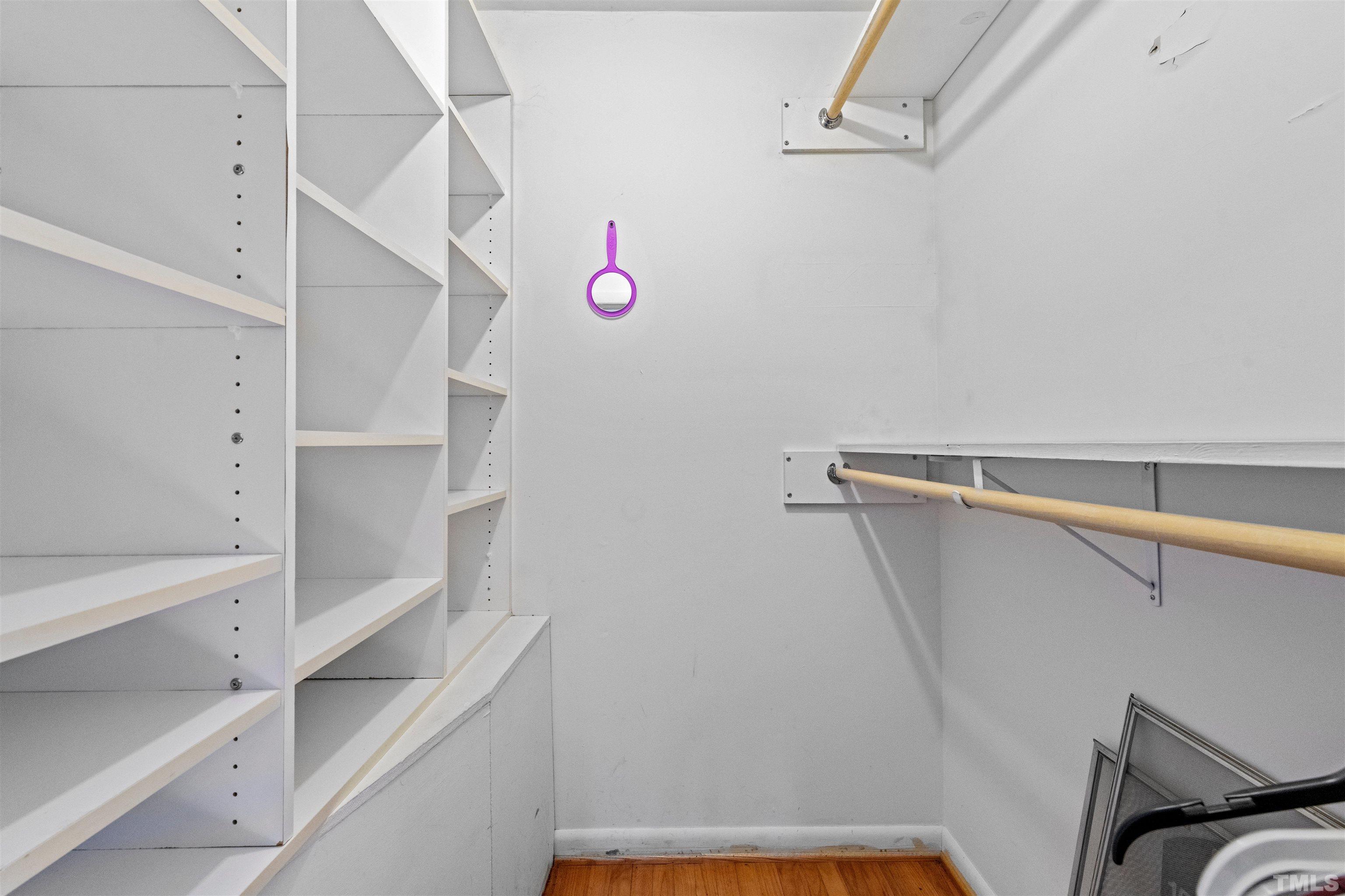 6000 Buffaloe Road Raleigh, NC 27616 - Photo 22 of 36 a view of walk in closet with empty racks