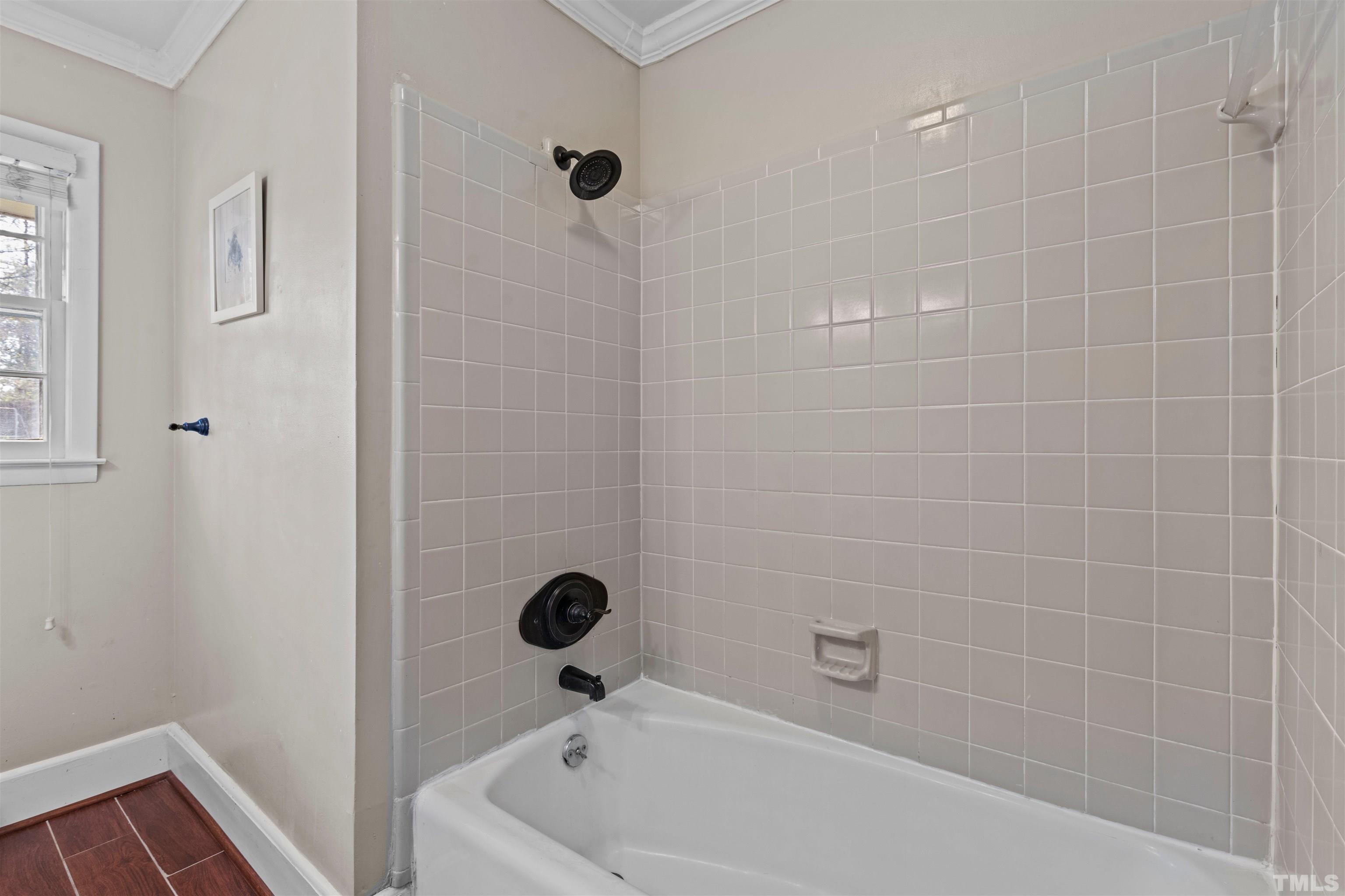 6000 Buffaloe Road Raleigh, NC 27616 - Photo 26 of 36 a bathroom with a bathtub