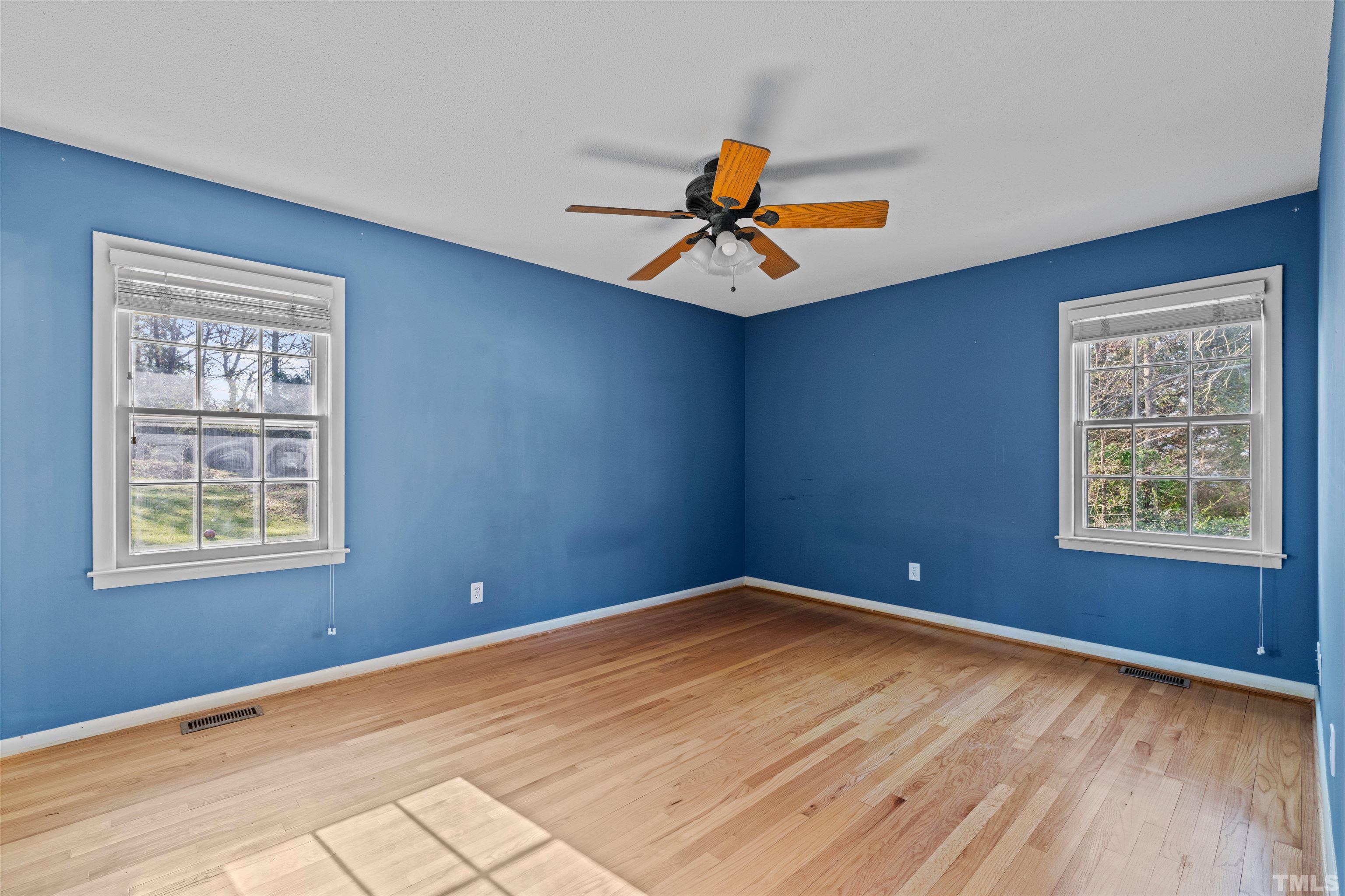 6000 Buffaloe Road Raleigh, NC 27616 - Photo 29 of 36 a view of room with window and wooden floor
