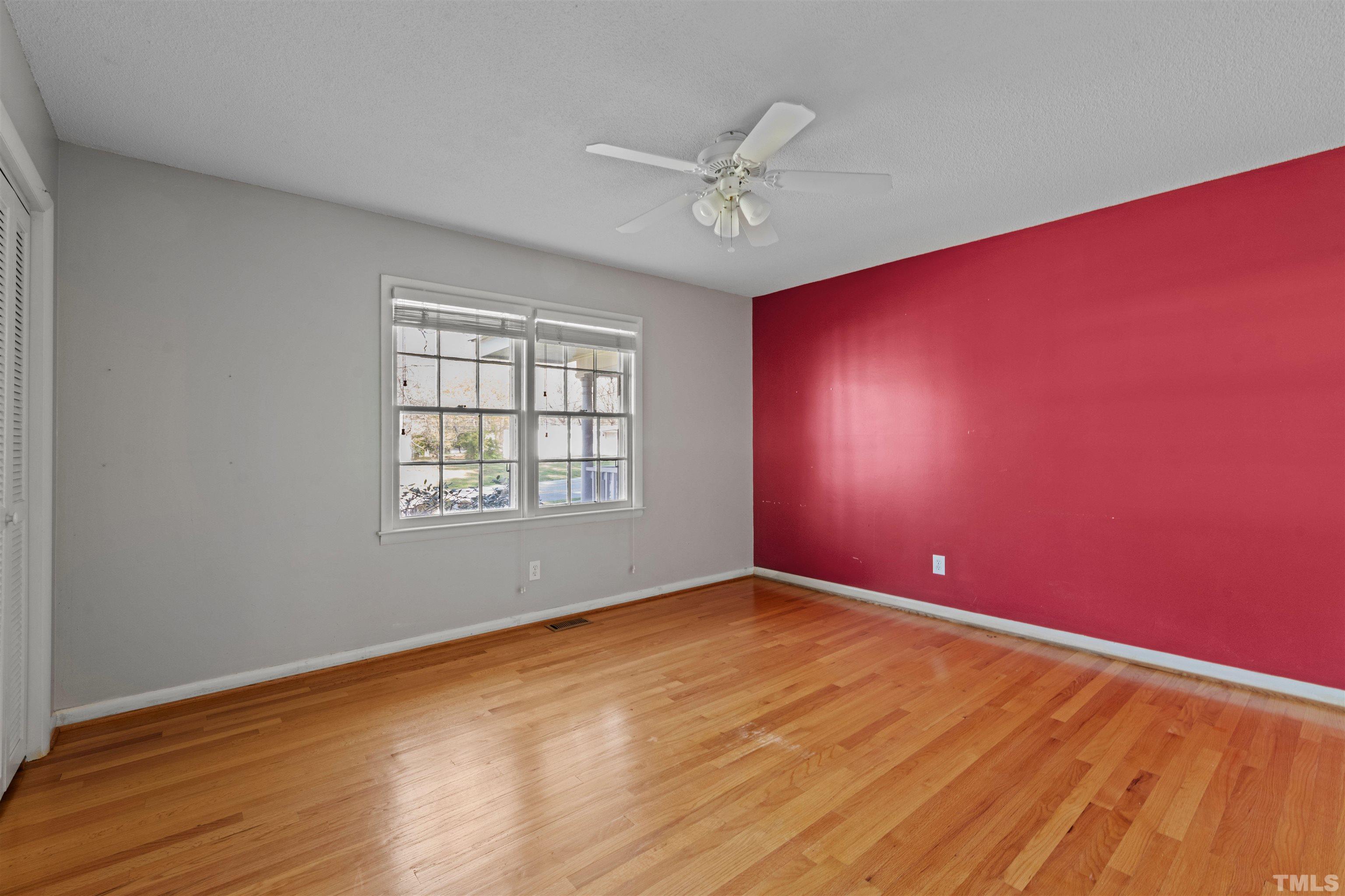 6000 Buffaloe Road Raleigh, NC 27616 - Photo 31 of 36 a view of a big room with wooden floor and windows
