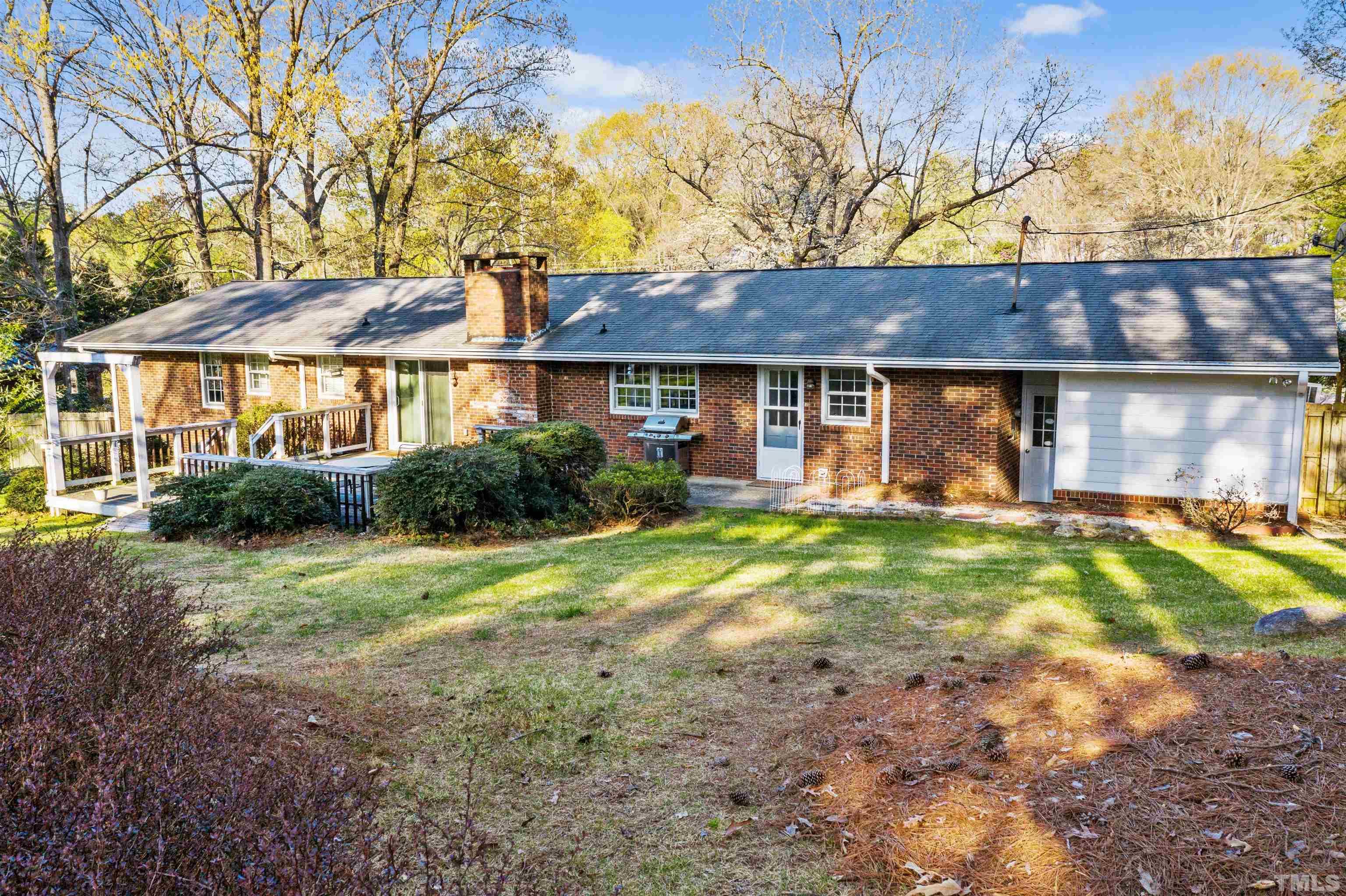6000 Buffaloe Road Raleigh, NC 27616 - Photo 10 of 36 a front view of a house with garden
