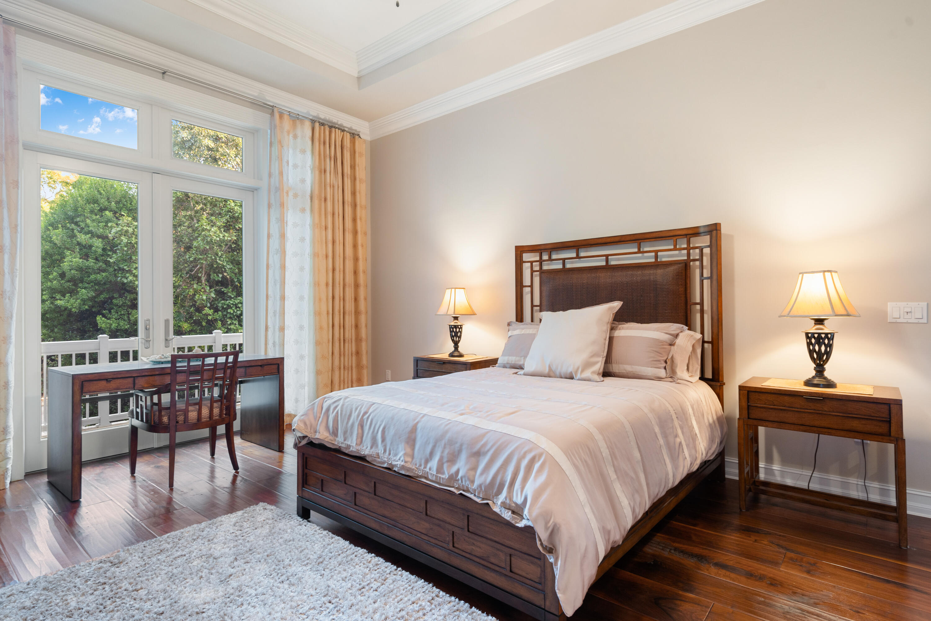 104 Coastal Drive Key Largo, FL 33037 - Photo 17 of 77 a bedroom with a bed and a table