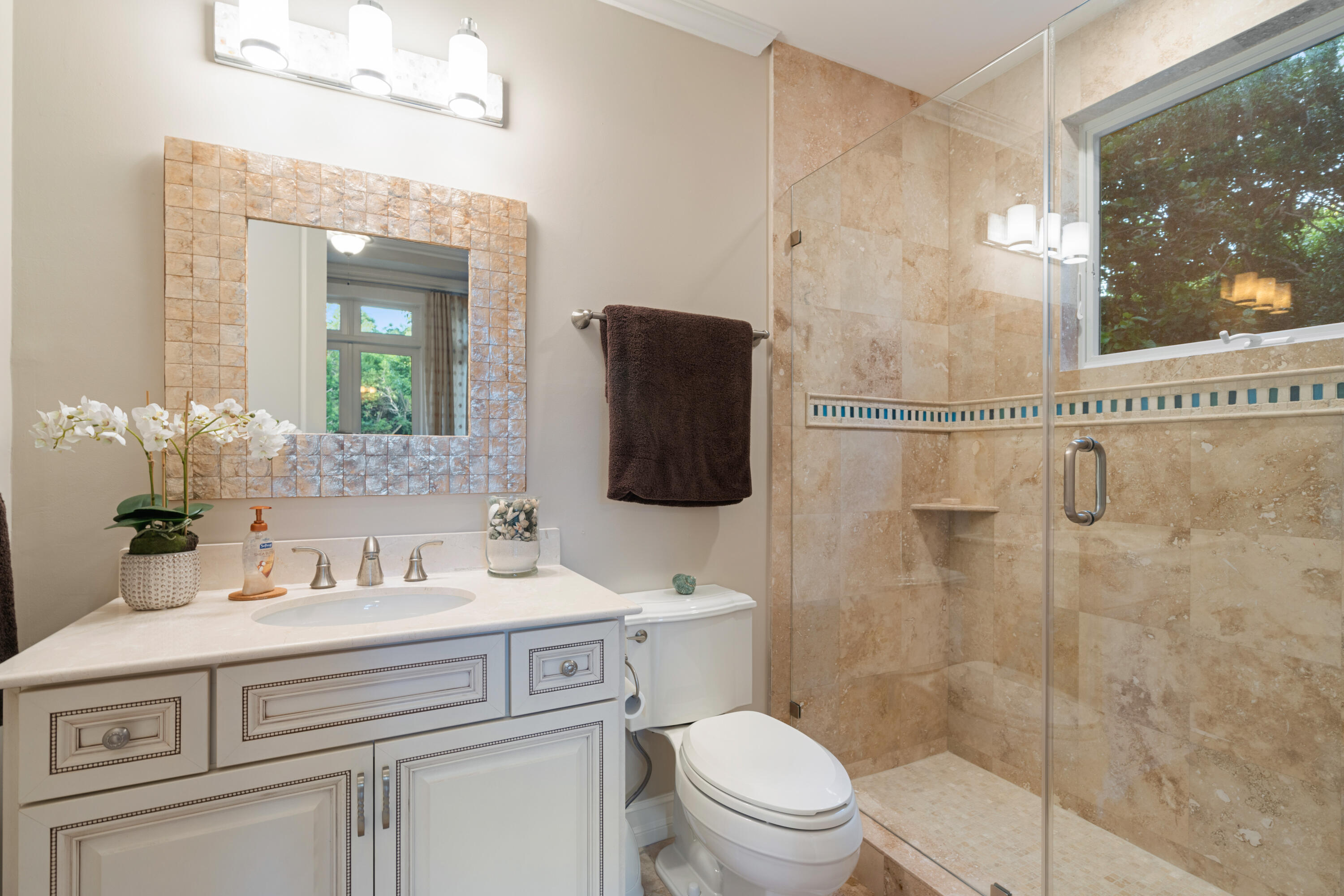 104 Coastal Drive Key Largo, FL 33037 - Photo 18 of 77 a bathroom with a sink toilet and shower