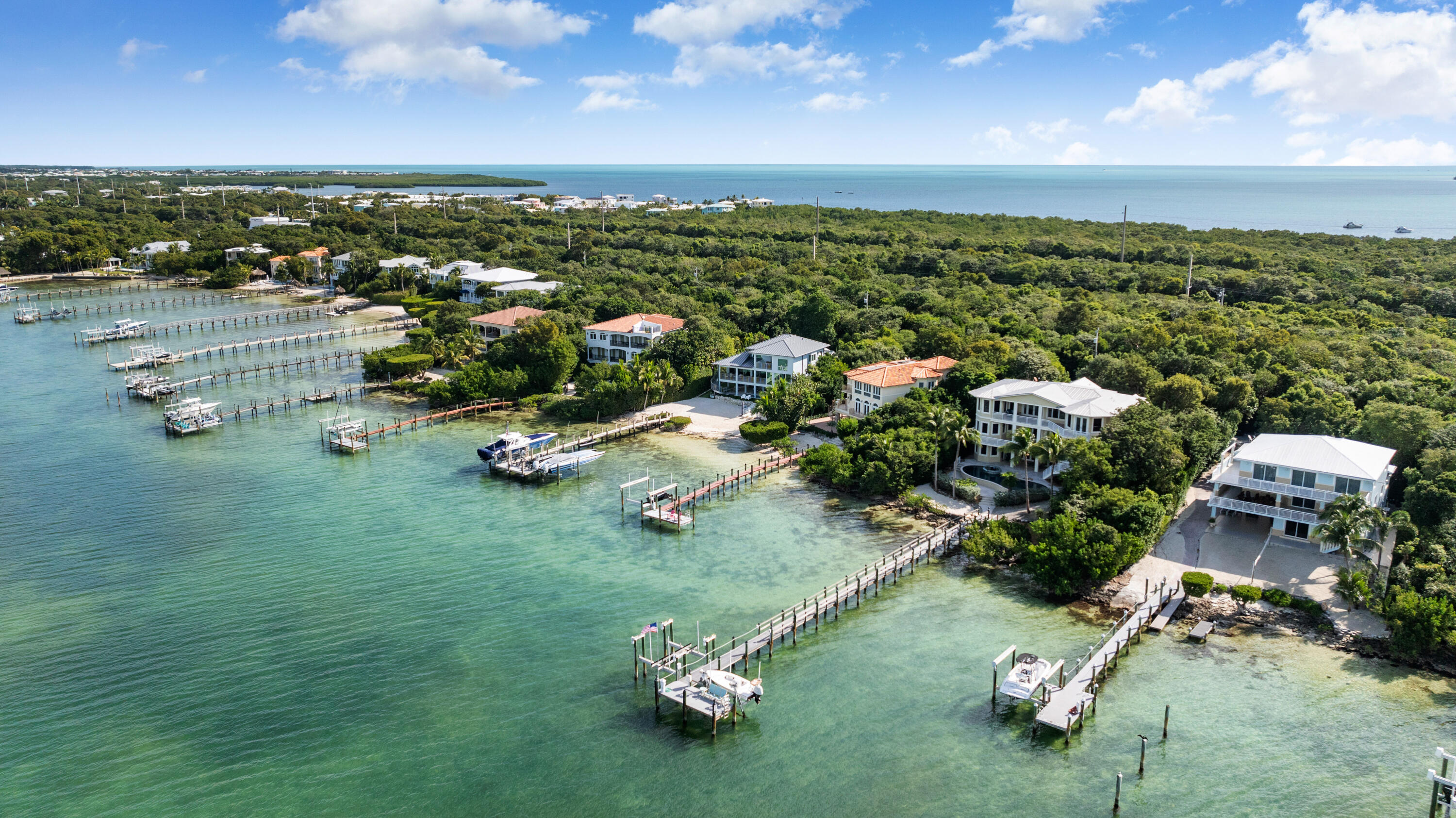 104 Coastal Drive Key Largo, FL 33037 - Photo 25 of 77 an aerial view of a house with a garden