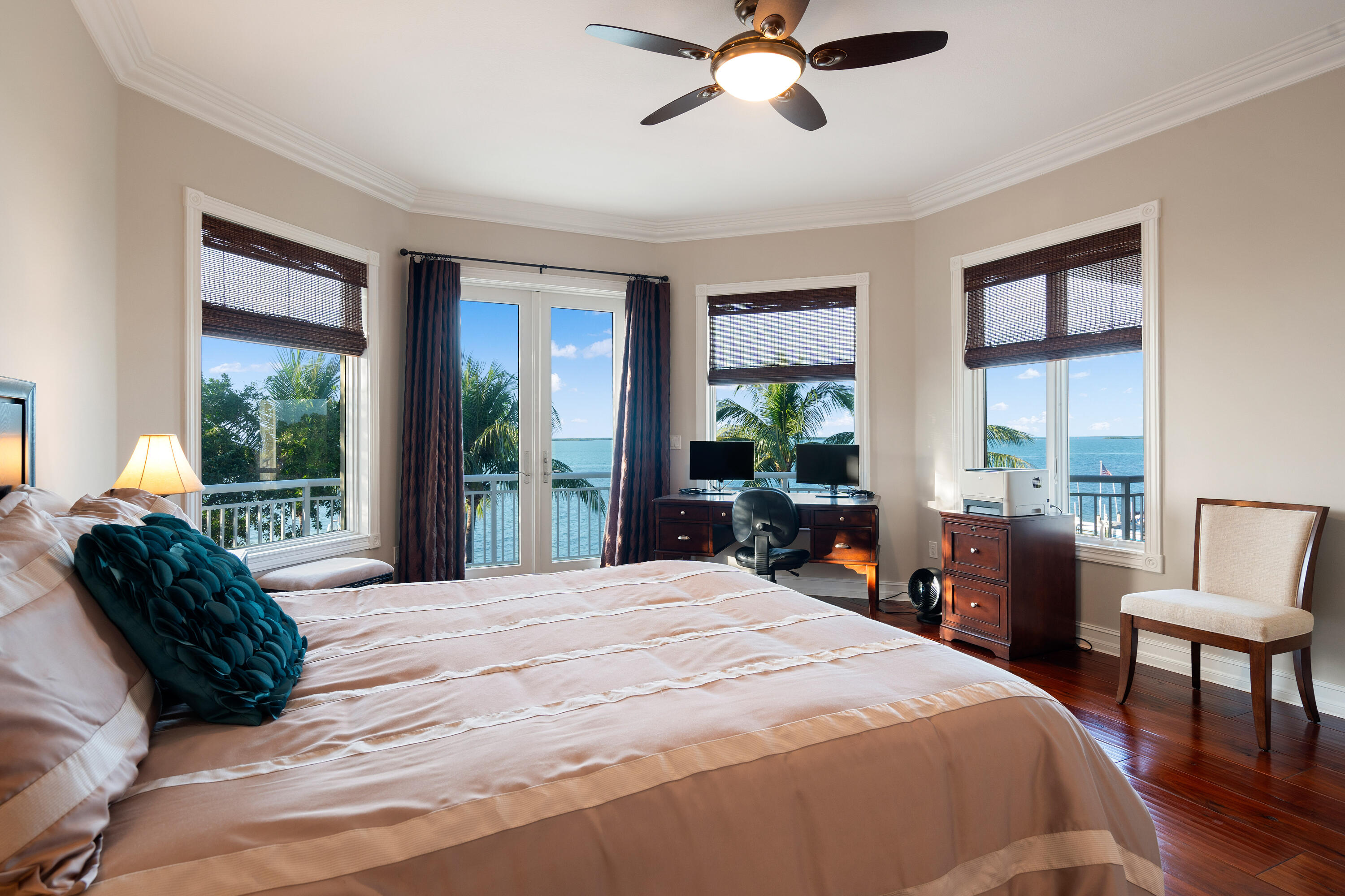 104 Coastal Drive Key Largo, FL 33037 - Photo 41 of 77 a bedroom with a bed and a large window