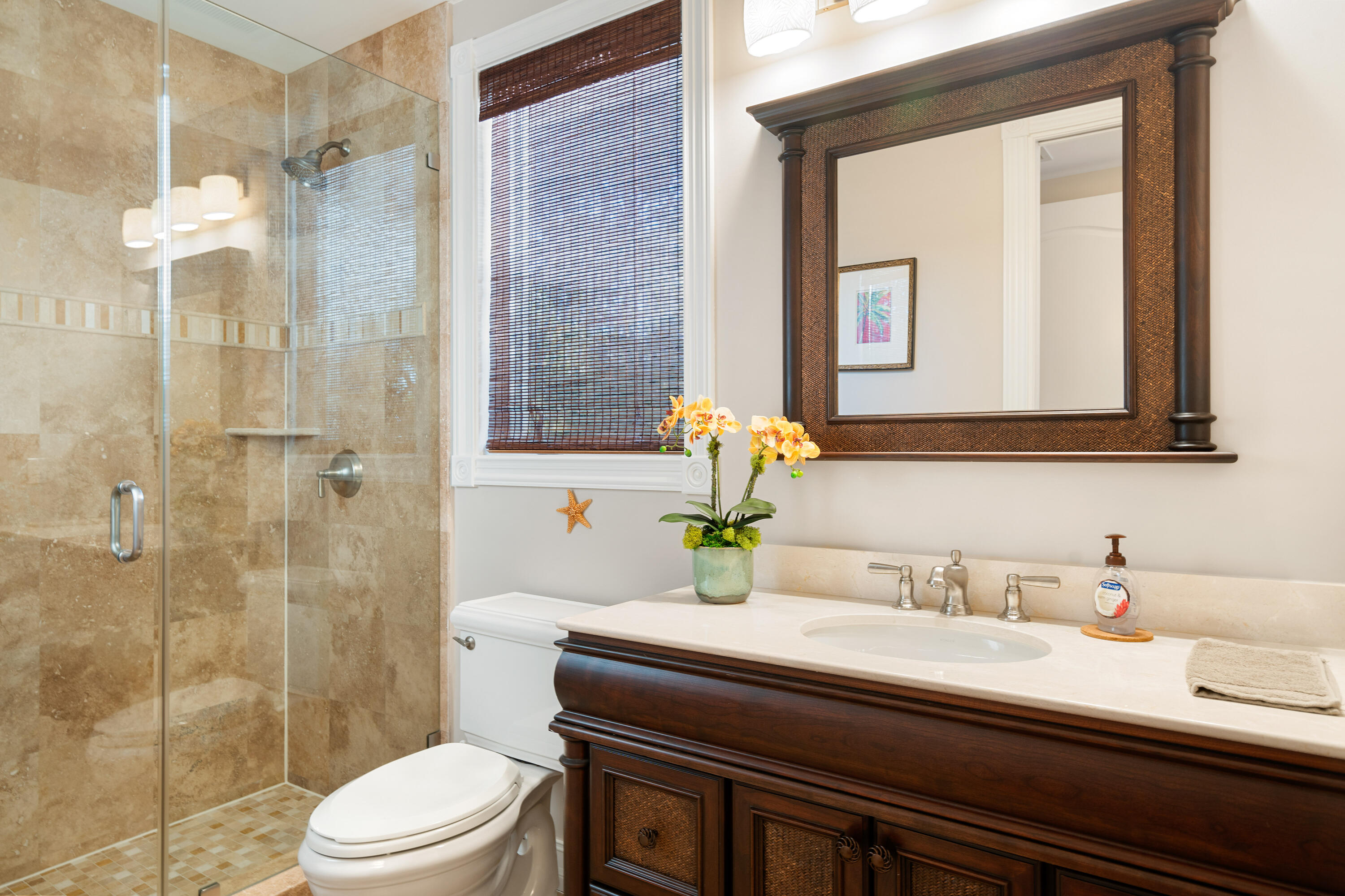 104 Coastal Drive Key Largo, FL 33037 - Photo 42 of 77 a bathroom with a granite countertop sink toilet a mirror and shower