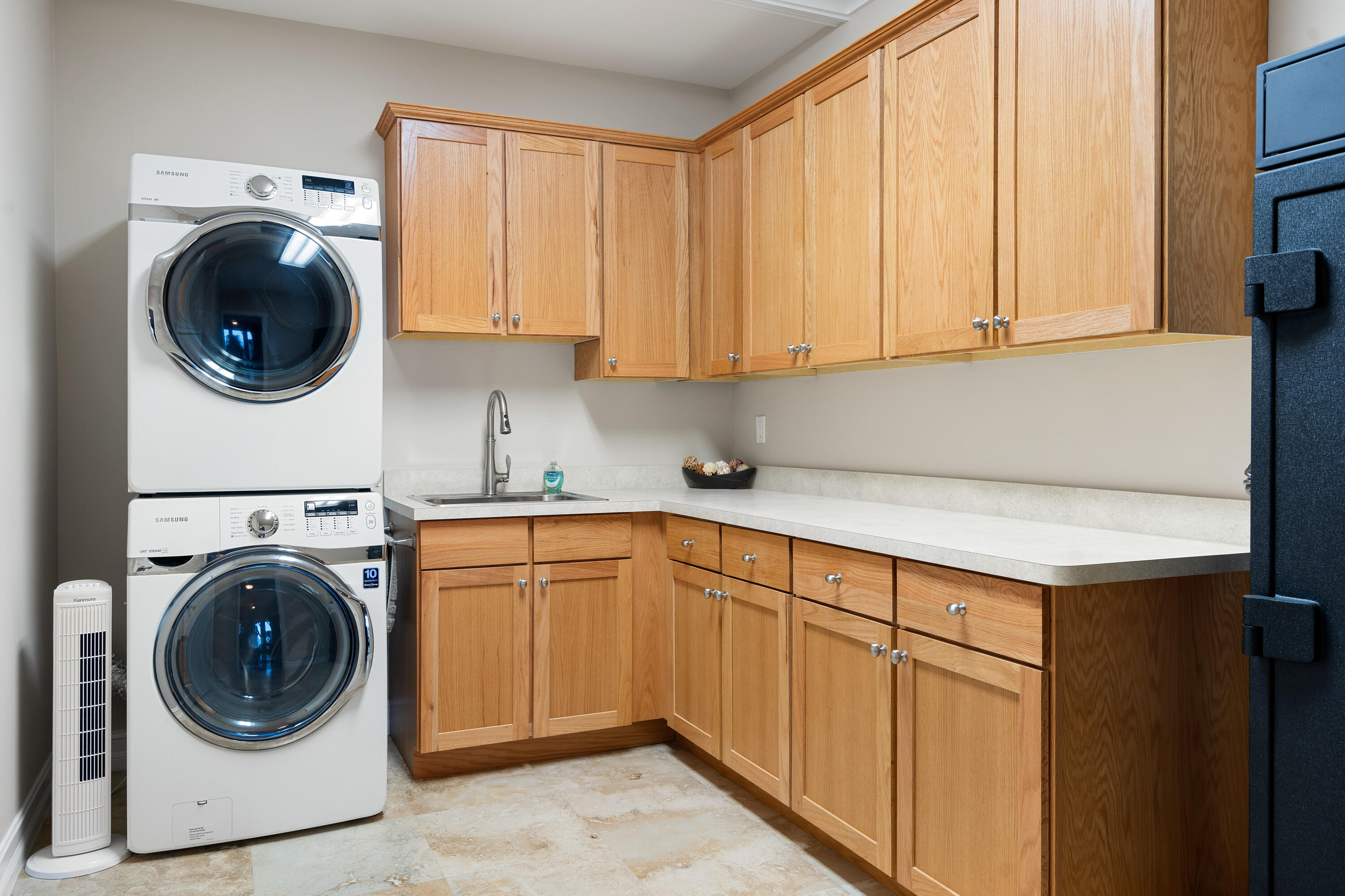 104 Coastal Drive Key Largo, FL 33037 - Photo 59 of 77 a kitchen with a stove top oven sink and cabinets