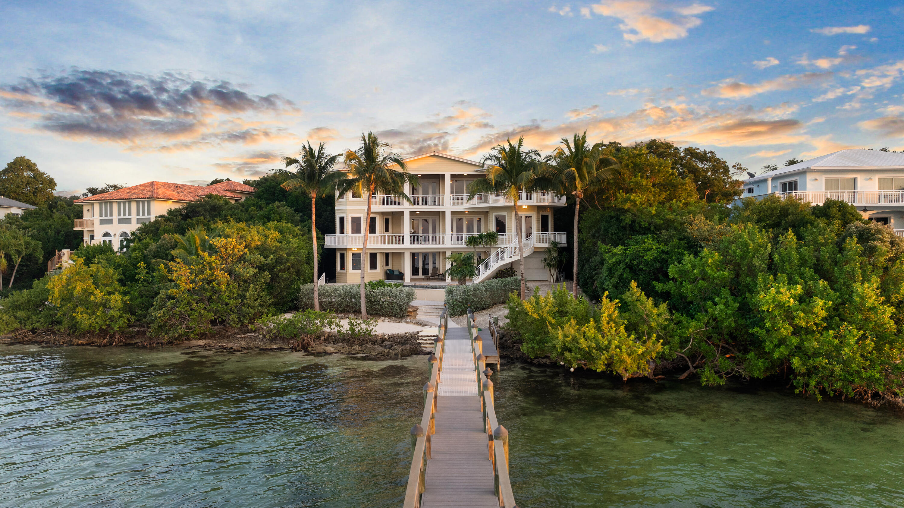 104 Coastal Drive Key Largo, FL 33037 - Photo 7 of 77 a view of a house with a yard