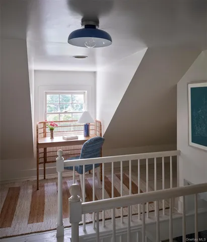 a view of a porch with wooden floor and outdoor space