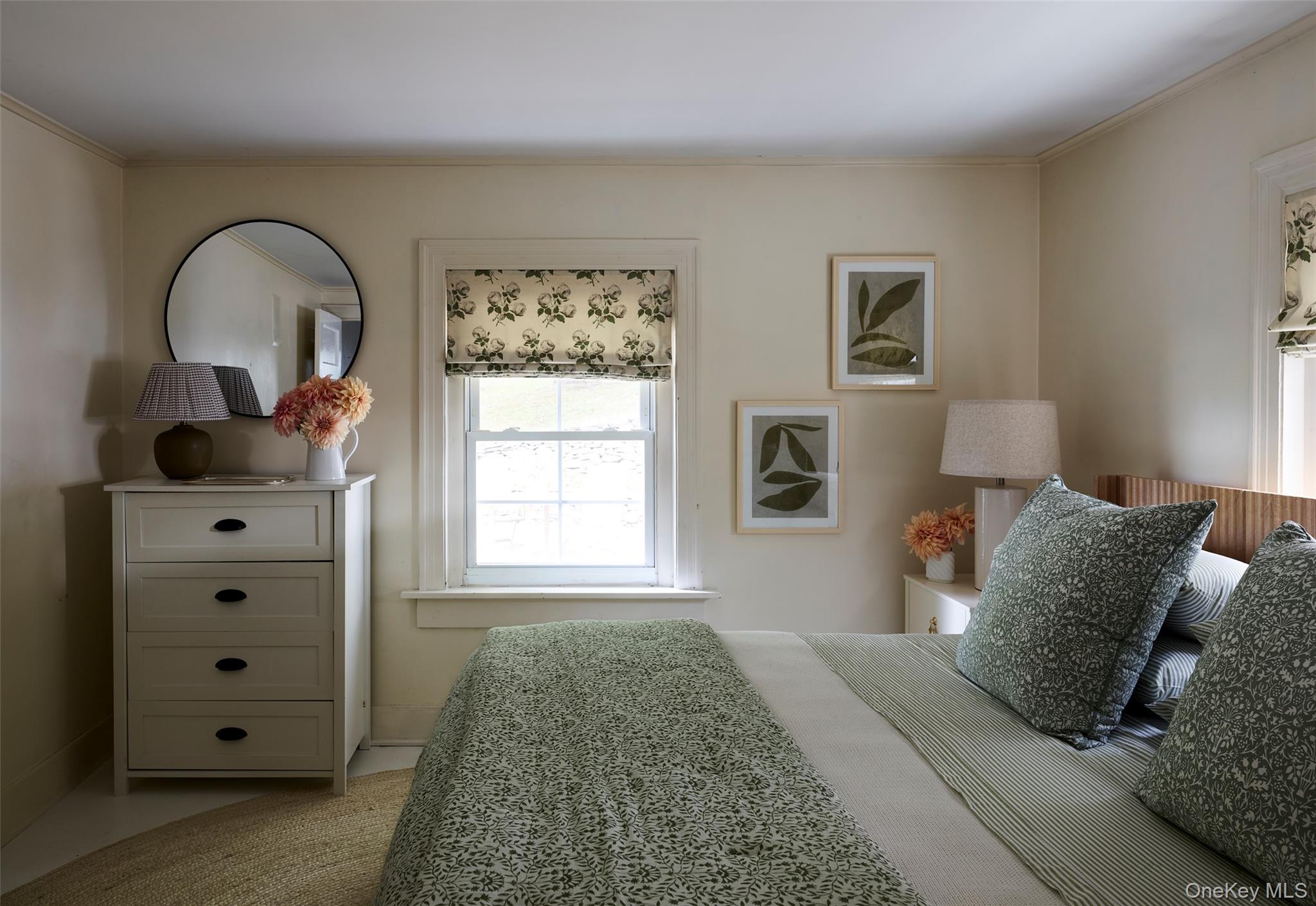 11 Sutton Road Millbrook, NY 12545 - Photo 9 of 25 a bedroom with a bed and a window