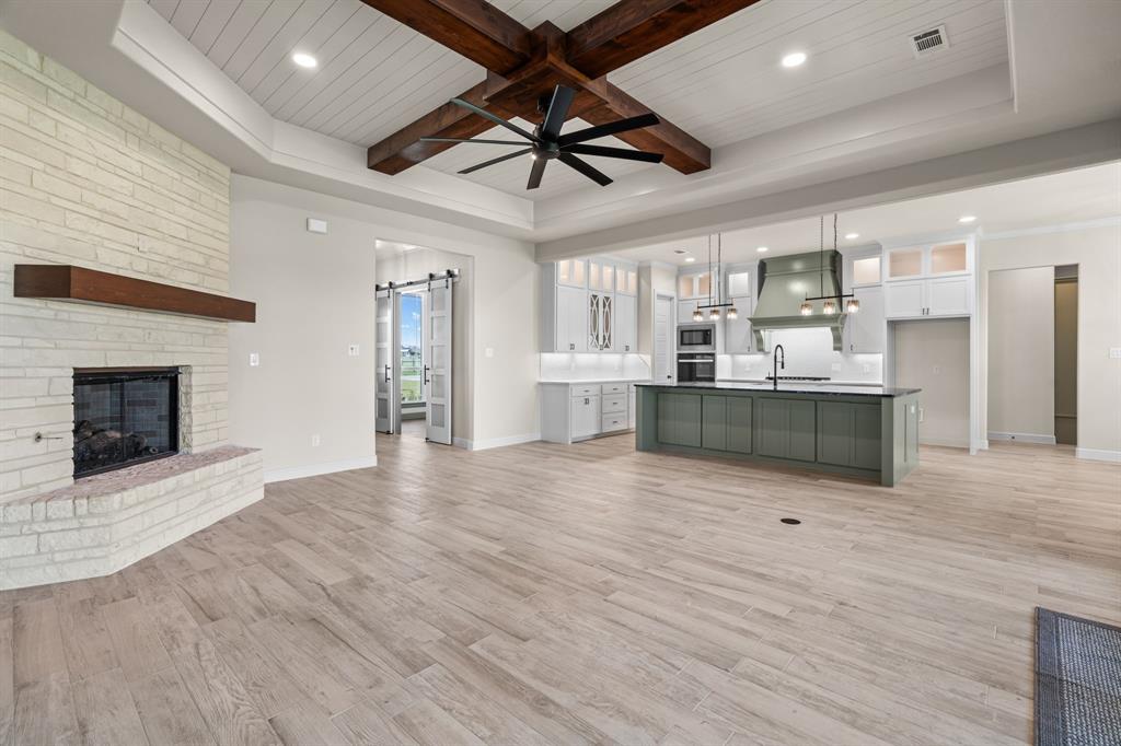 161 Frontera Drive Decatur, TX 76234 - Photo 10 of 39 Living Room opens to the Beautiful Kitchen