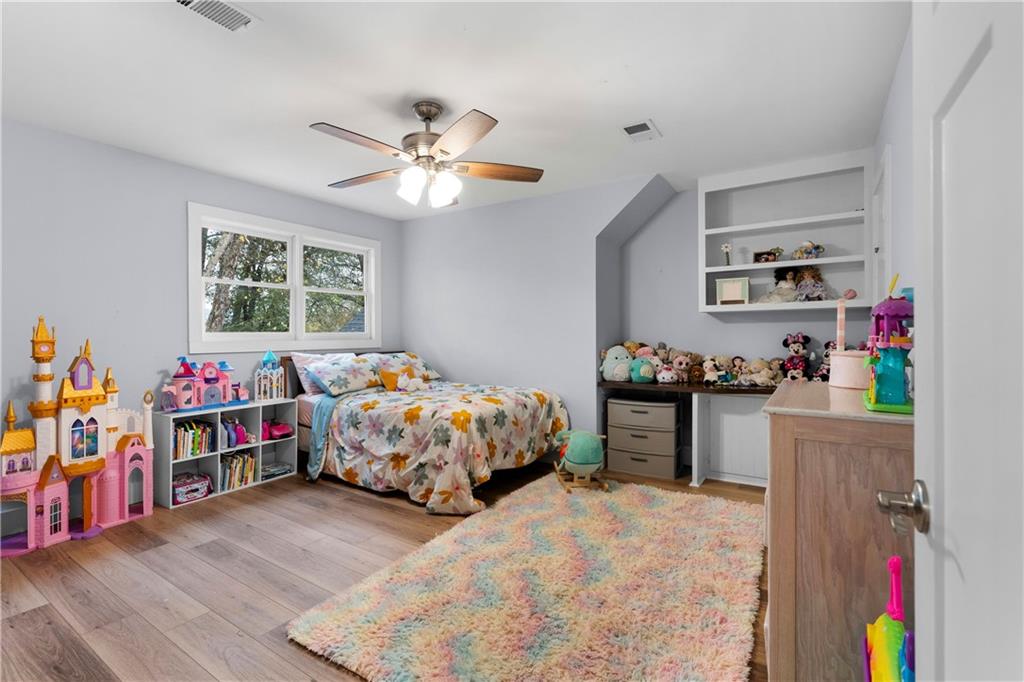 12 Allison Circle Cartersville, GA 30120 - Photo 24 of 35 a bedroom with a bed and dresser