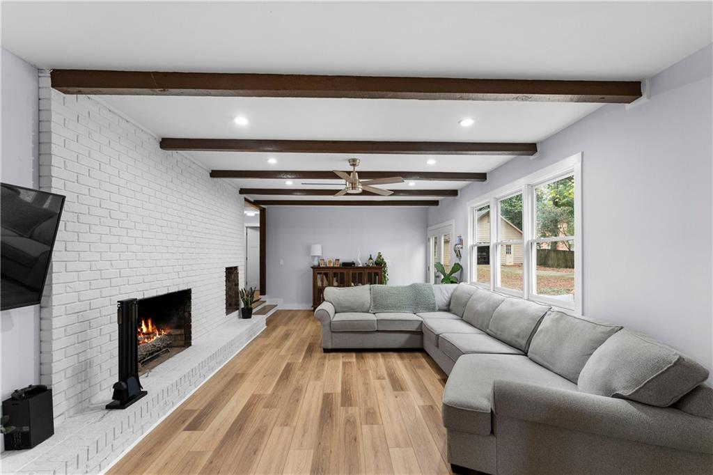 12 Allison Circle Cartersville, GA 30120 - Photo 8 of 35 a living room with furniture and a fireplace