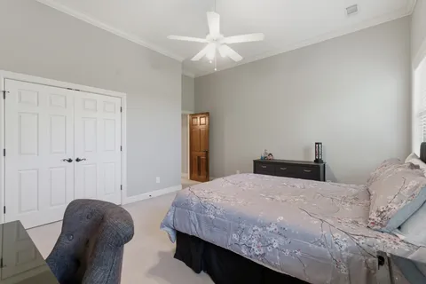 a living room with furniture and white walls