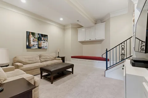 a kitchen with stainless steel appliances granite countertop a stove refrigerator and microwave