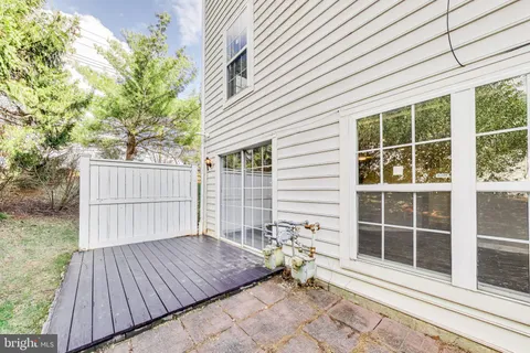 a front view of a house with a large window