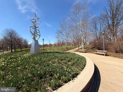 a view of a yard with a fountain