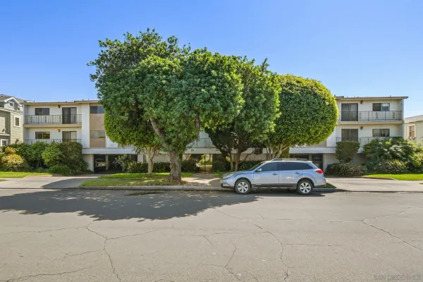 a picture of a book and a bed