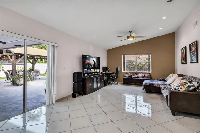 a view of swimming pool with seating space