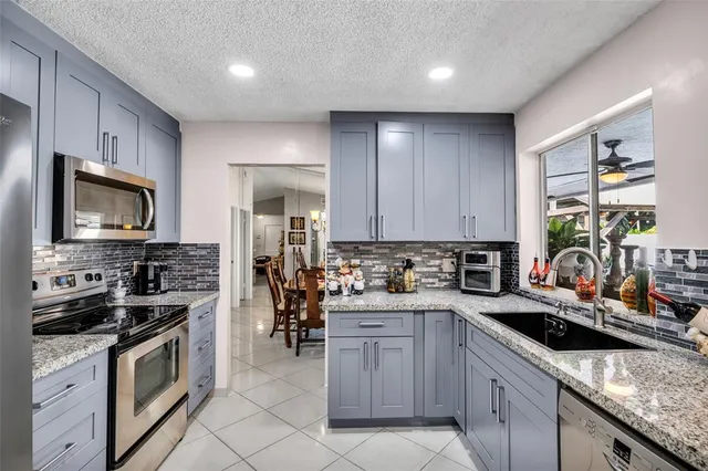 $824,999 | 5210 Hawkes Bluff Avenue, Davie, FL 33331