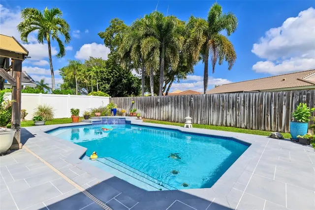 $824,999 | 5210 Hawkes Bluff Avenue, Davie, FL 33331