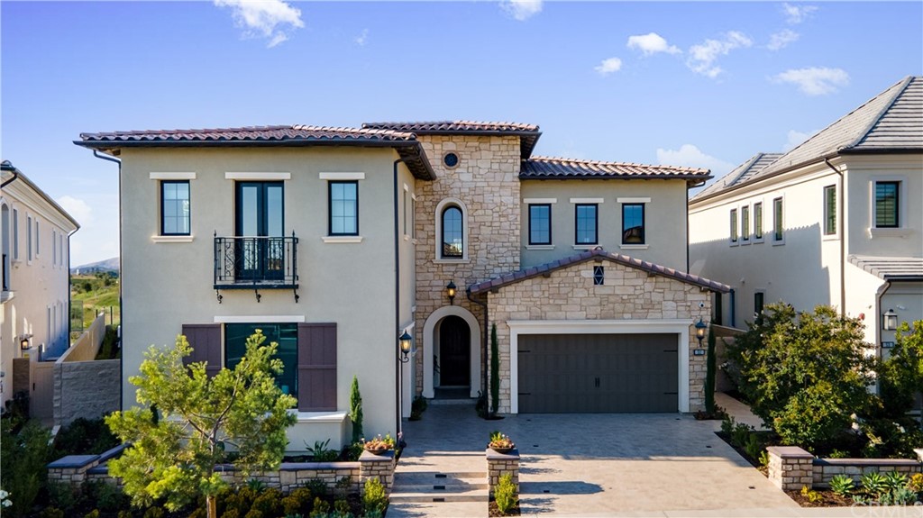 a front view of a house with yard