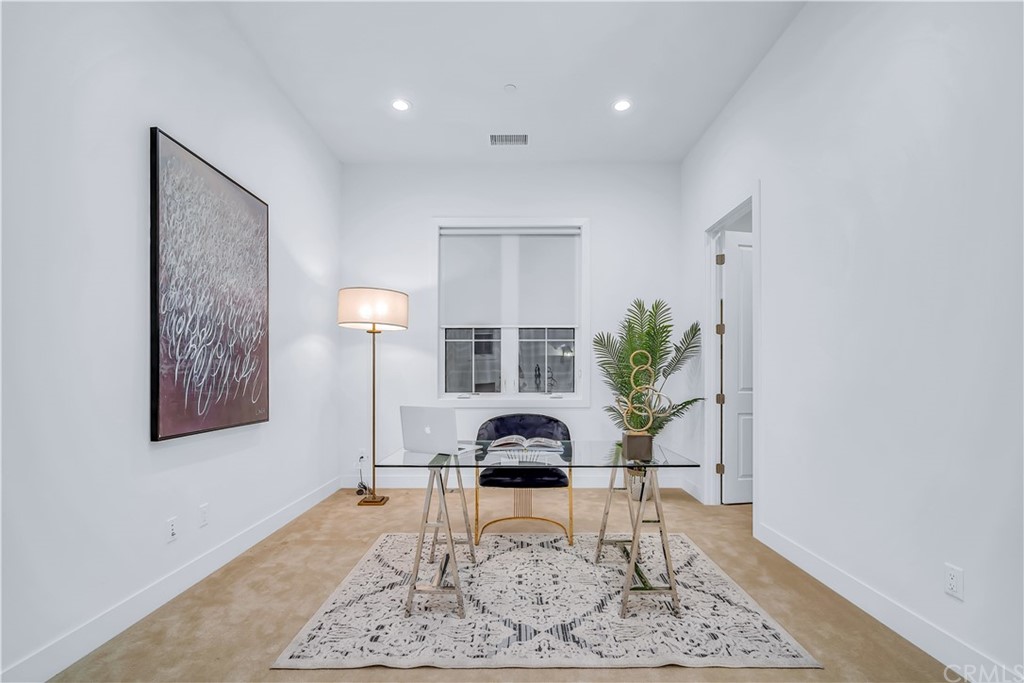 51 Interstellar Irvine, CA 92618 - Photo 21 of 51 a living room with furniture and a rug