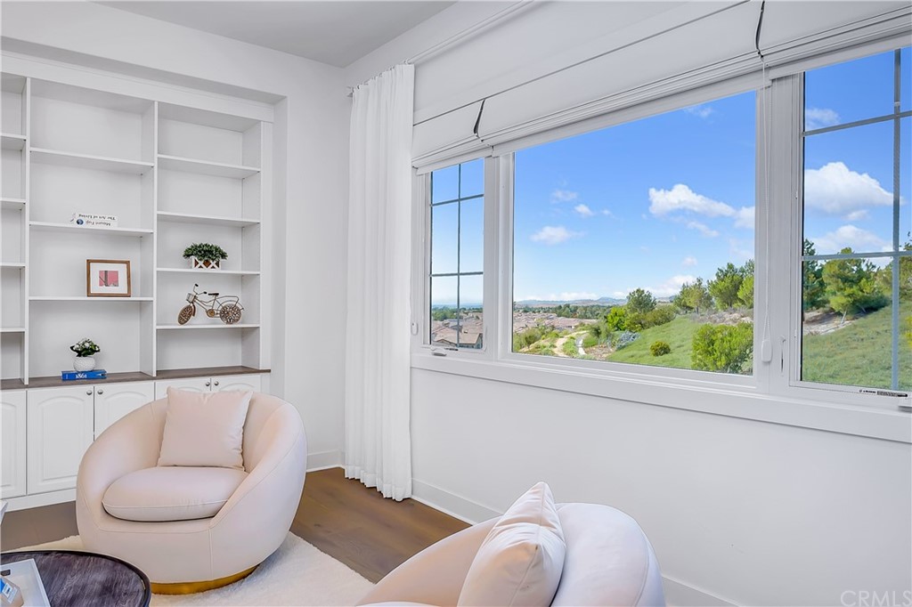 51 Interstellar Irvine, CA 92618 - Photo 24 of 51 a living room with furniture and a large window