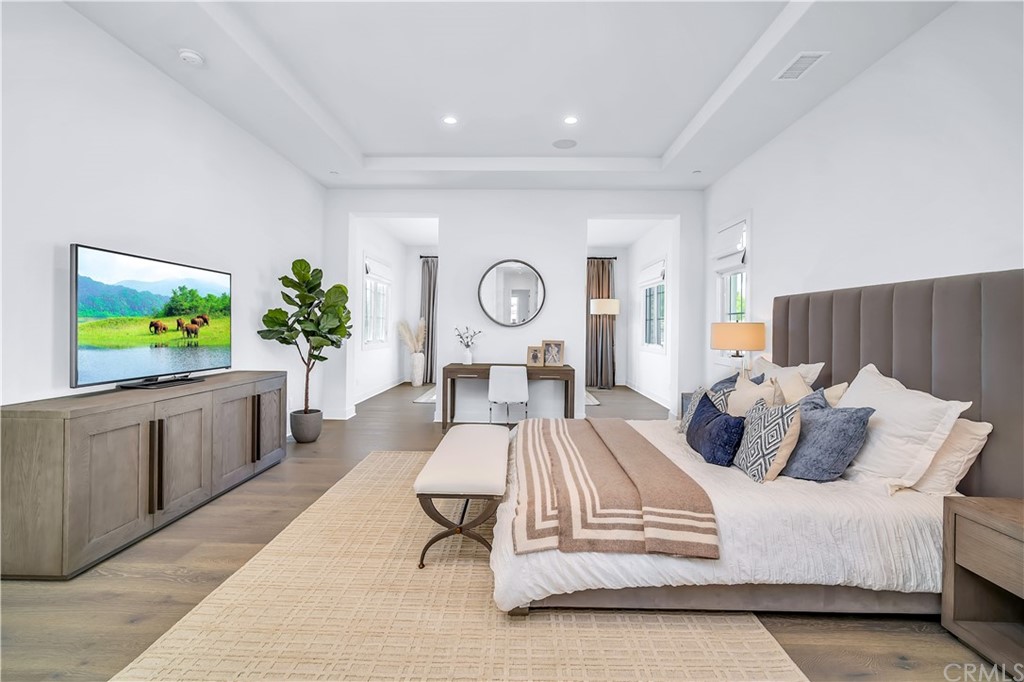 51 Interstellar Irvine, CA 92618 - Photo 26 of 51 a living room with furniture and a flat screen tv