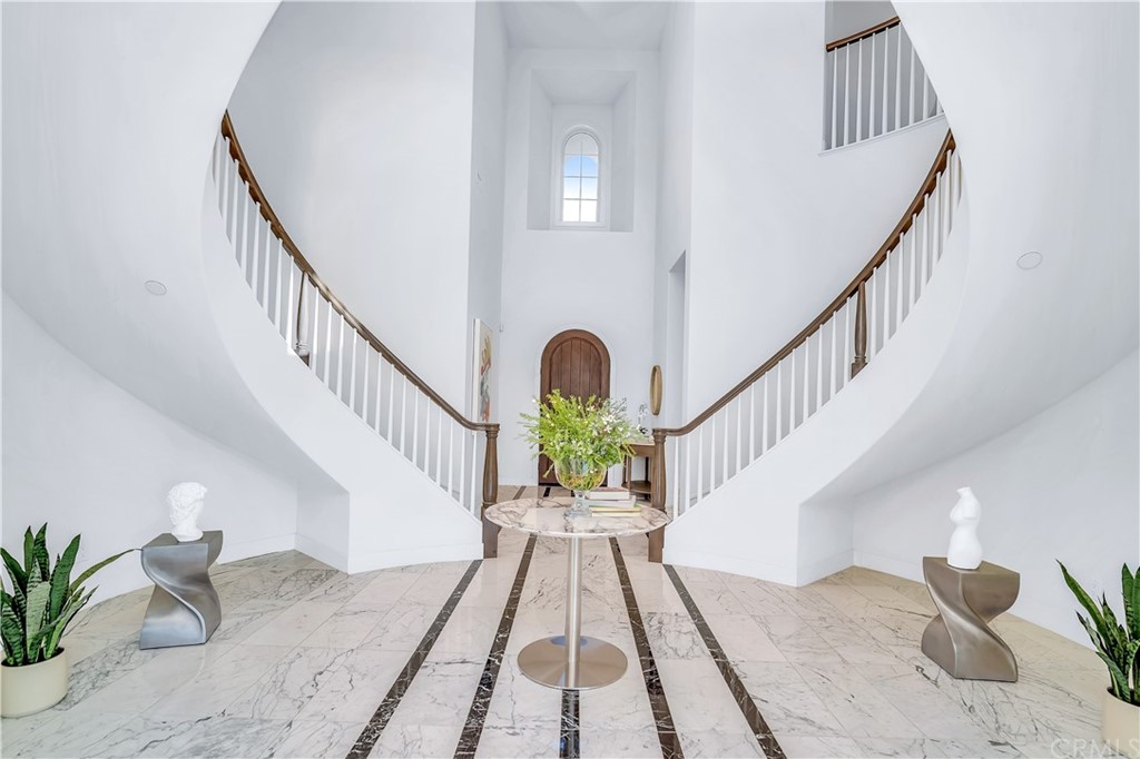 51 Interstellar Irvine, CA 92618 - Photo 3 of 51 a view of entryway and hall with wooden floor