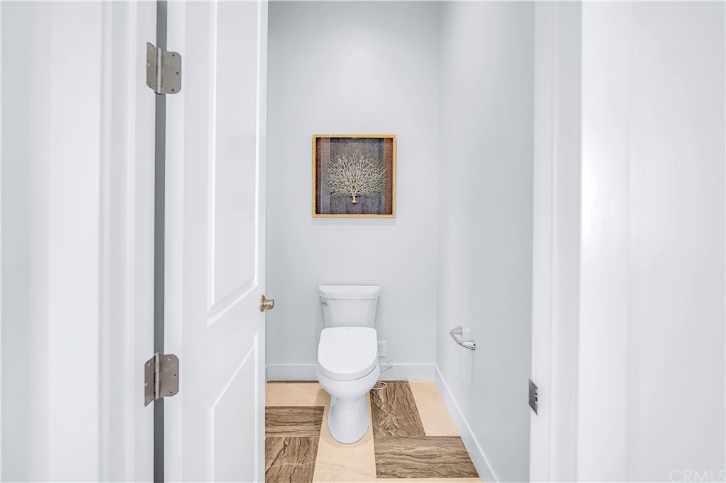 51 Interstellar Irvine, CA 92618 - Photo 33 of 51 a bathroom with a toilet and a shower