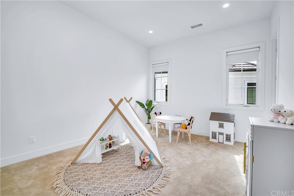 51 Interstellar Irvine, CA 92618 - Photo 39 of 51 a living room with furniture and a wooden floor