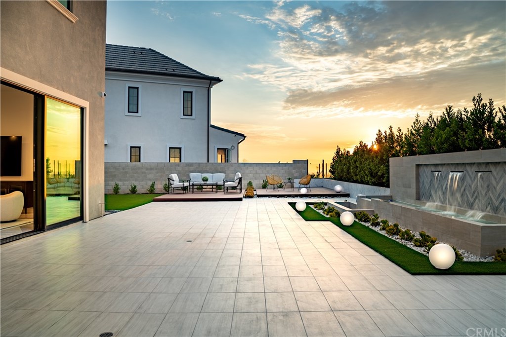 51 Interstellar Irvine, CA 92618 - Photo 45 of 51 a view of a house with a swimming pool and furniture