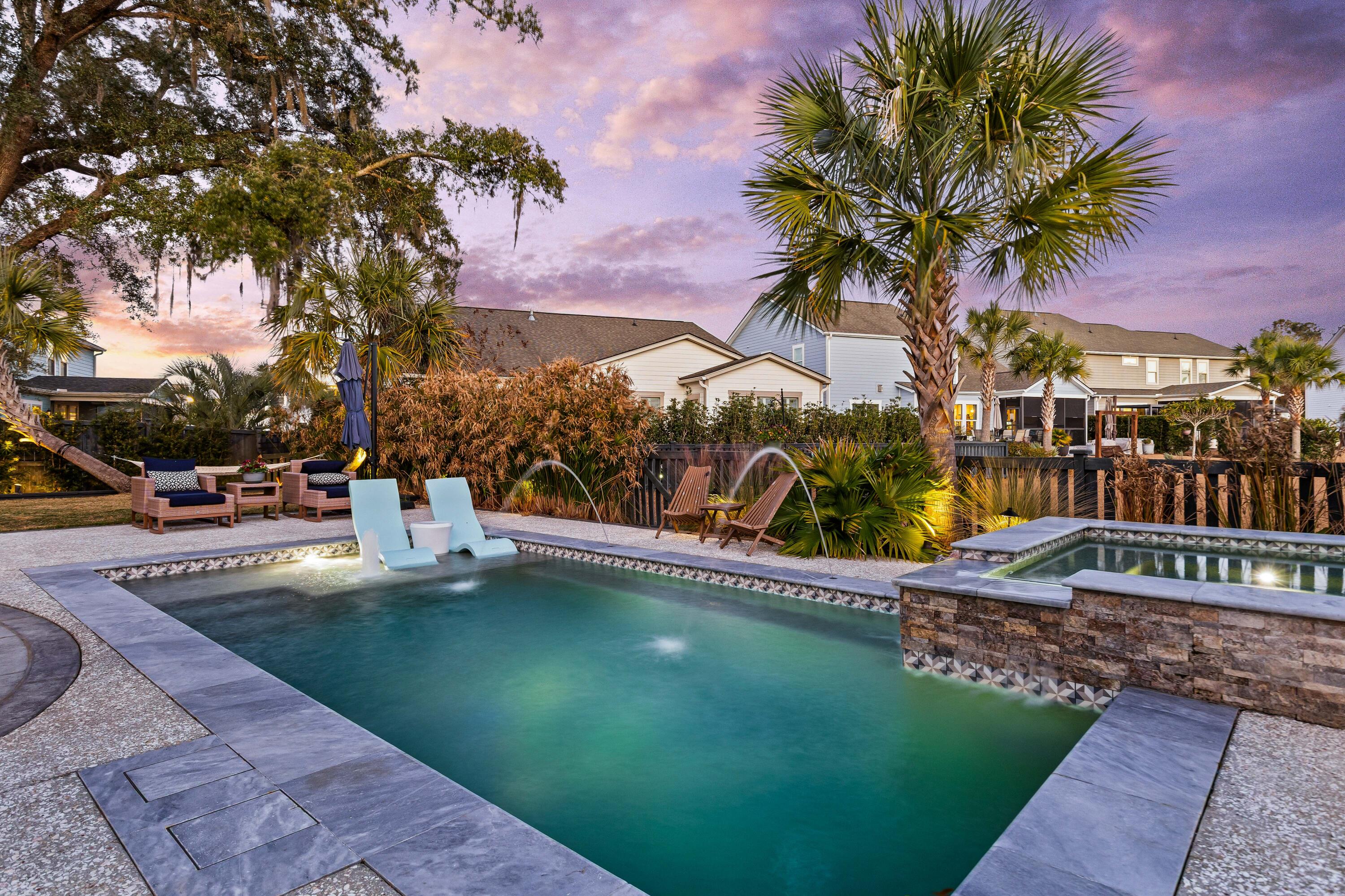1826 Whisperwood Road Johns Island, SC 29455 - Photo 3 of 67 Heated saltwater pool w/ spa at sunset