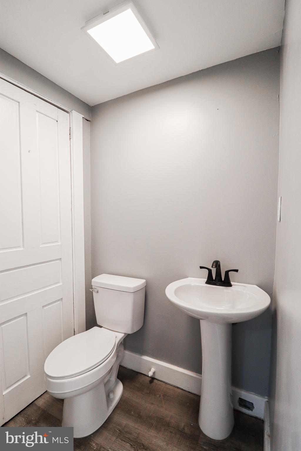 68 South Albemarle Street York, PA 17403 - Photo 11 of 25 a bathroom with a sink toilet and a mirror