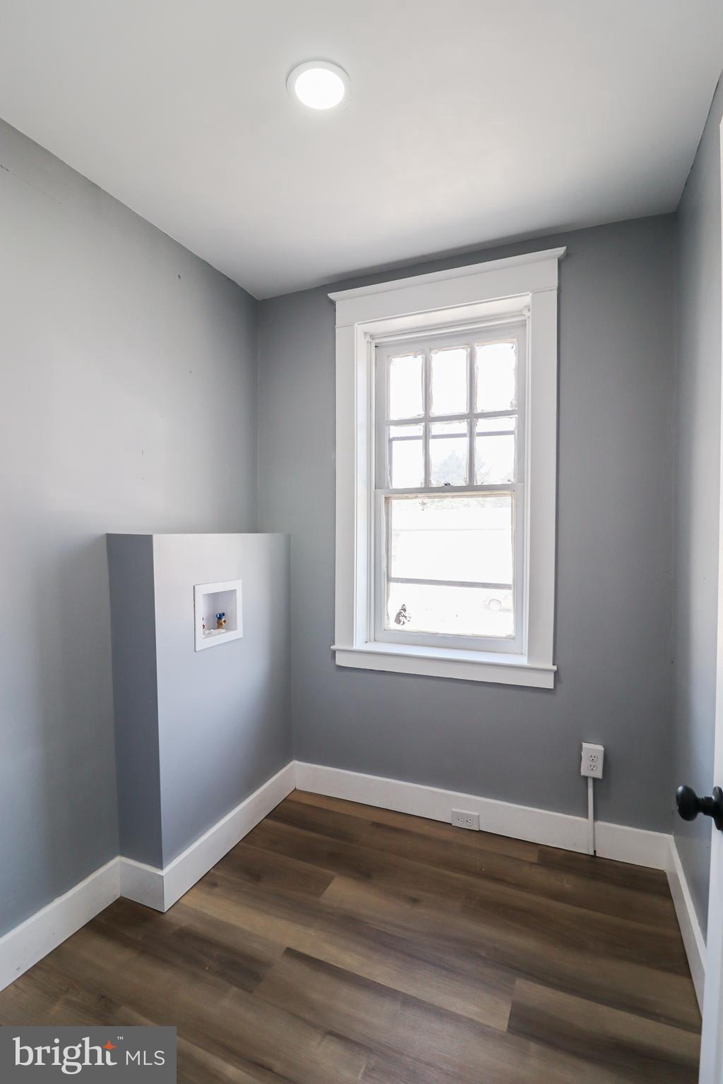 68 South Albemarle Street York, PA 17403 - Photo 15 of 25 an empty room with wooden floor and windows