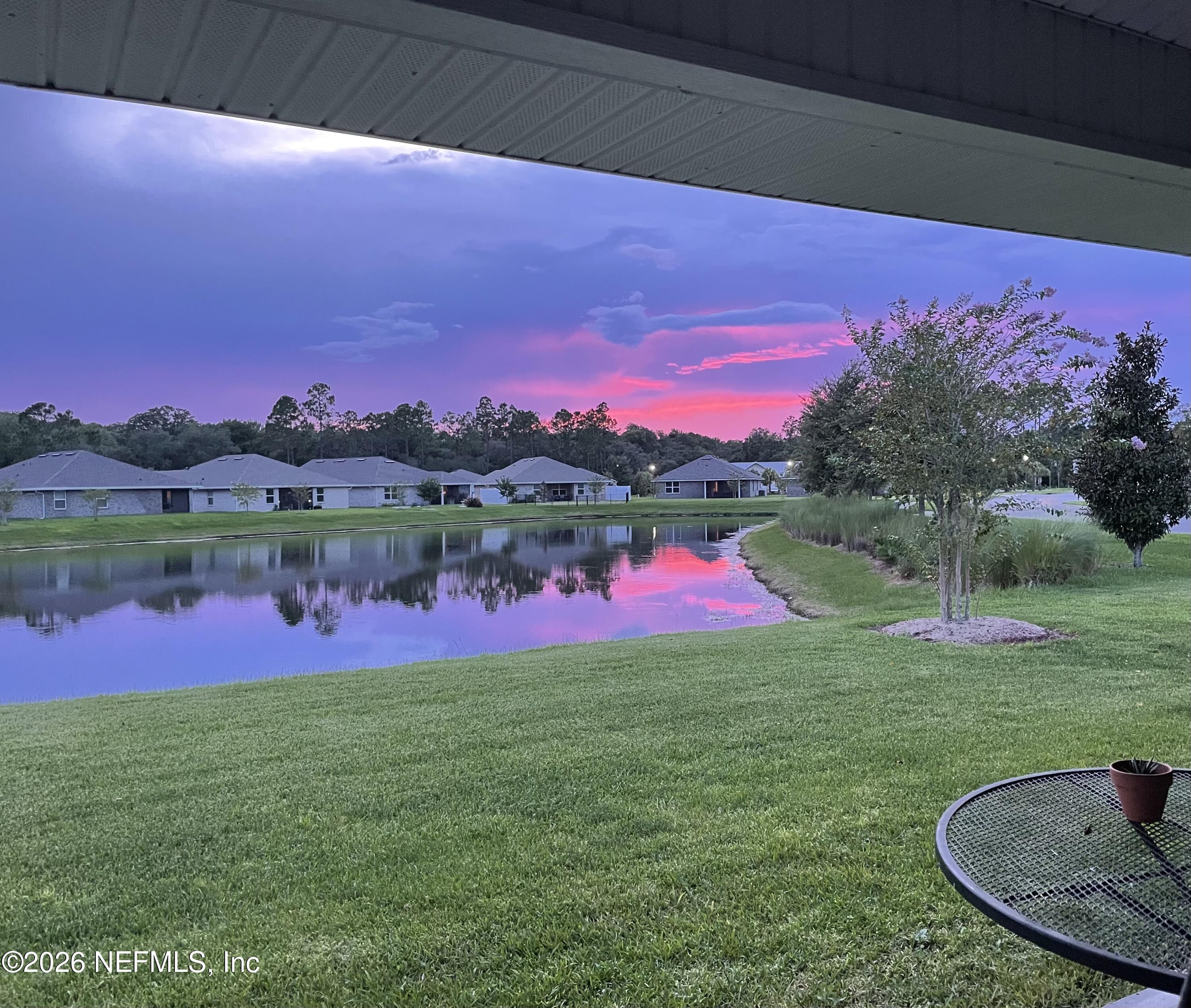2 Rivertown Road Palm Coast, FL 32137 - Photo 80 of 80 a view of a backyard with a lake