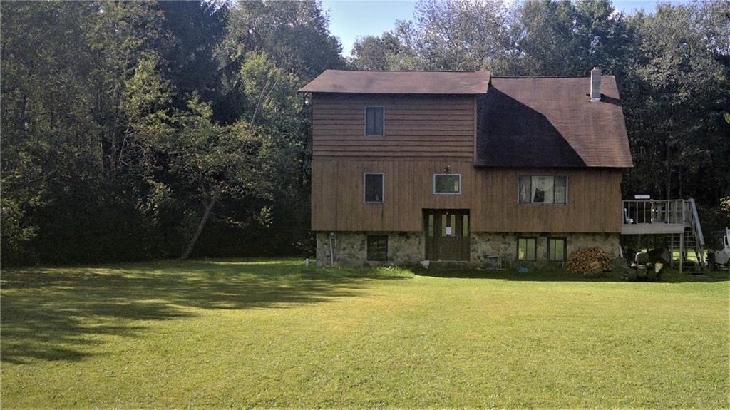 239 Malin Road Ridgway, PA 15853 - Photo 1 of 10 a house that has a tree in front of it