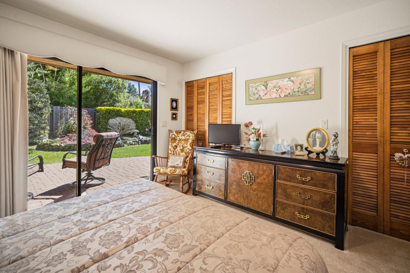 2911 Colton Road Pebble Beach, CA 93953 - Photo 38 of 46 a bed room with a bed and a large window