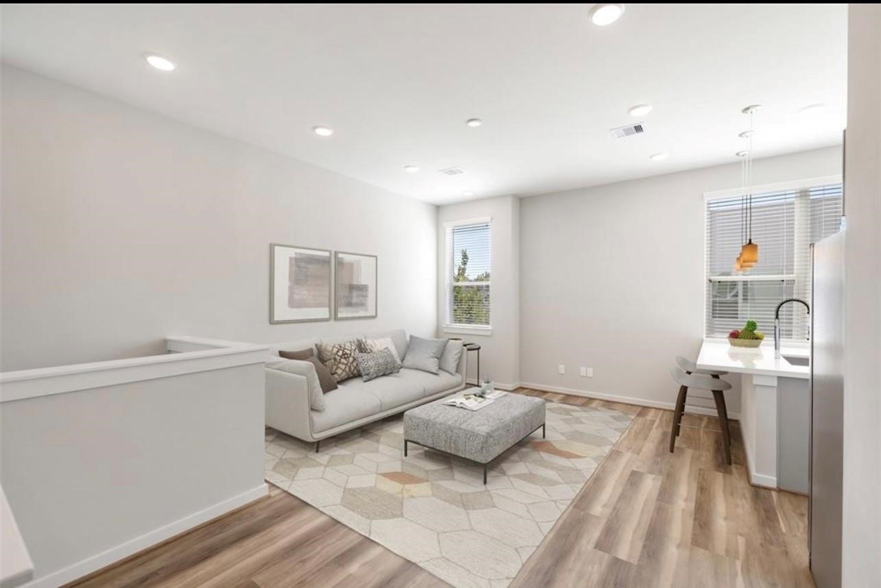 602 Thornton Road, Unit A Houston, TX 77018 - Photo 7 of 23 Second floor living room space. Staged photo
