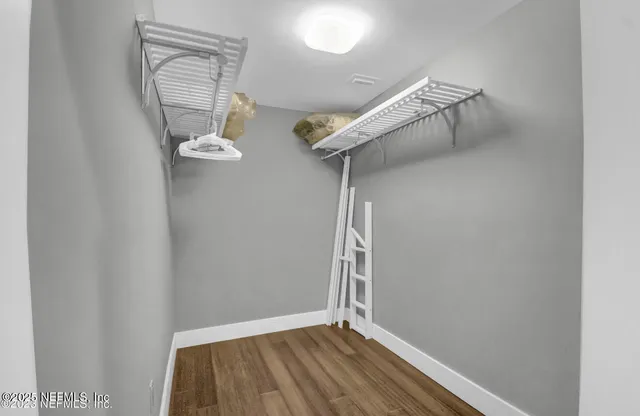 a view of a room with rack on the wall