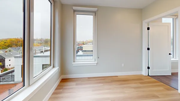 a view of an empty room and window