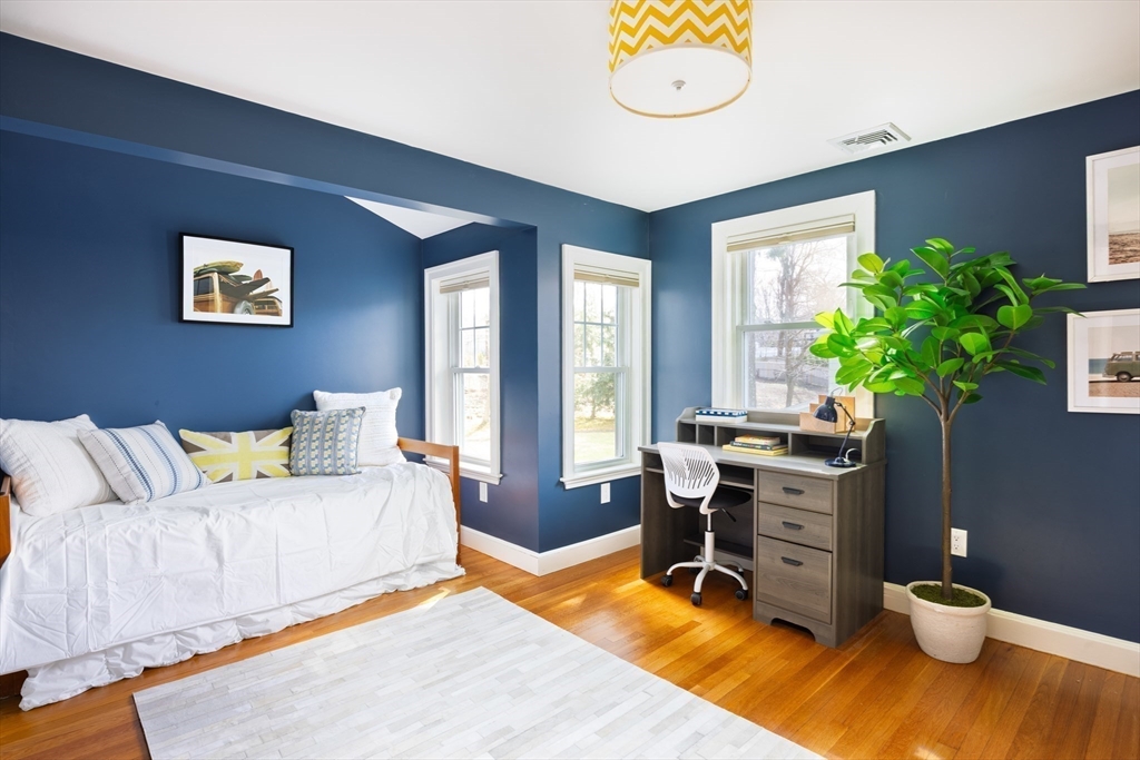 680 Beacon Street Newton, MA 02459 - Photo 15 of 26 a bedroom with furniture and a potted plant