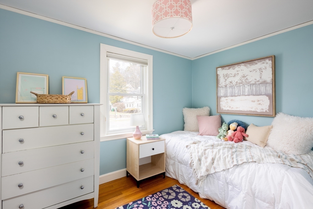 680 Beacon Street Newton, MA 02459 - Photo 16 of 26 a bedroom with a bed and a window
