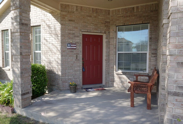 248 Cloud Crossing Cibolo, TX 78108 - Photo 1 of 1 a couple of table and chair in front of door