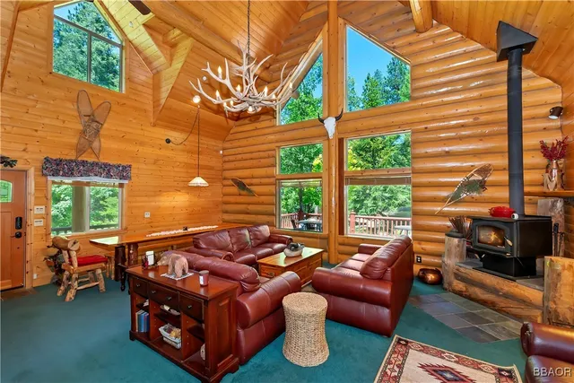 a outdoor living space with furniture and a fireplace