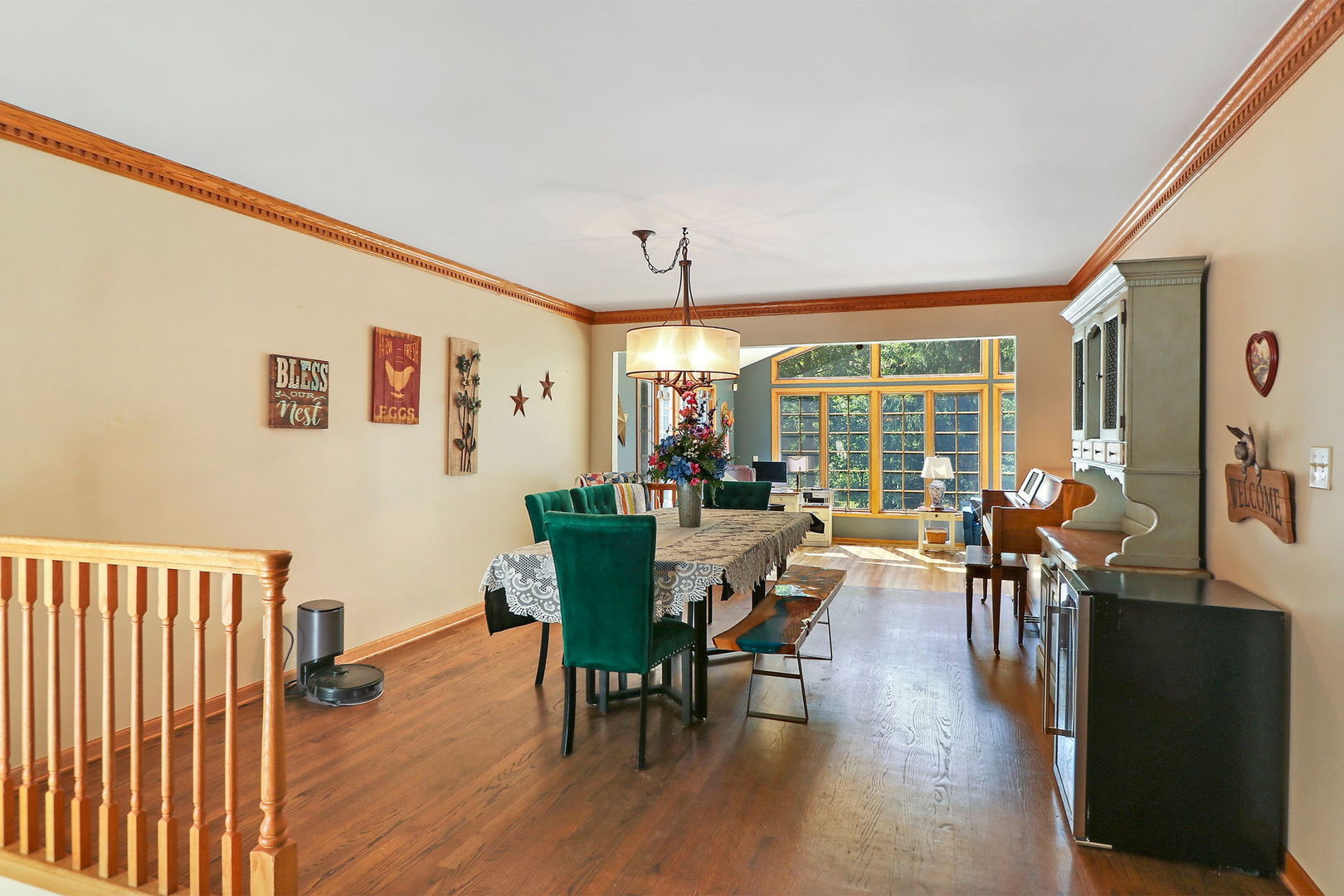 4602 Sunnyside Road Woodstock, IL 60098 - Photo 12 of 73 a view of a dining room with furniture window and wooden floor