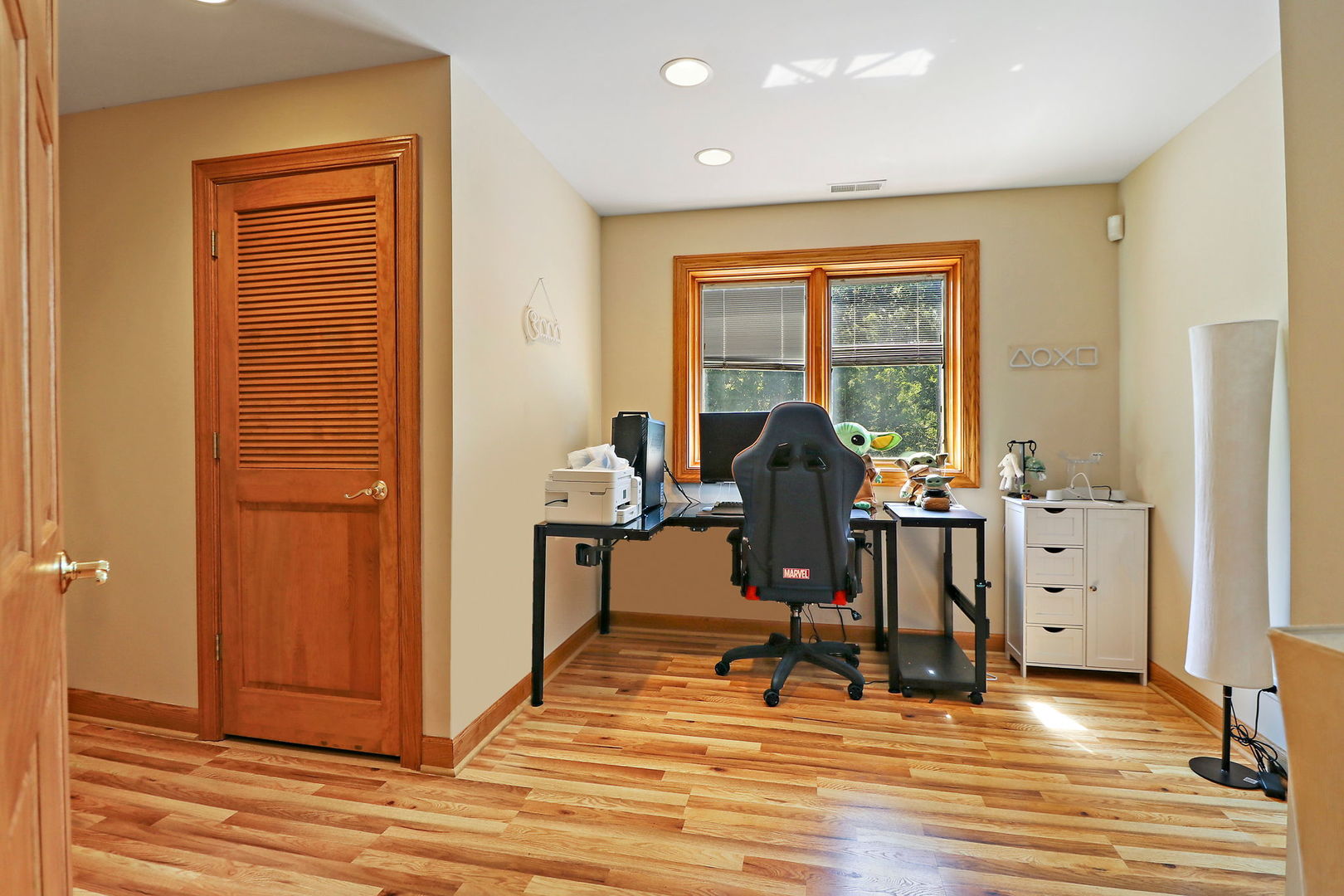 4602 Sunnyside Road Woodstock, IL 60098 - Photo 21 of 73 a view of a workspace with furniture and windows