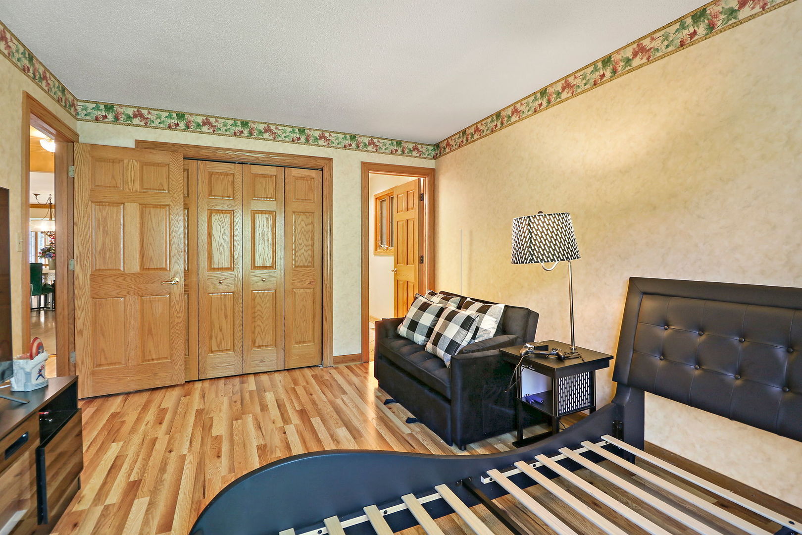 4602 Sunnyside Road Woodstock, IL 60098 - Photo 23 of 73 a living room with furniture and a flat screen tv